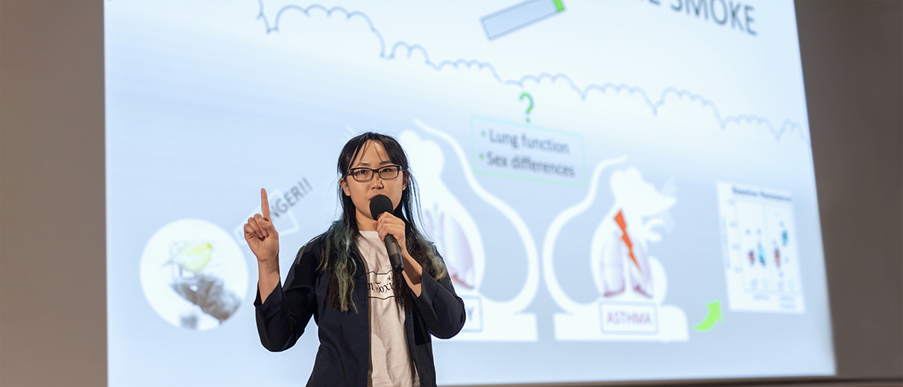 Vingie Ng competing at the Three Minute Thesis competition
