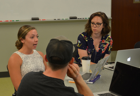Members of the University of Iowa's workshop series discuss ways to create successful courses.